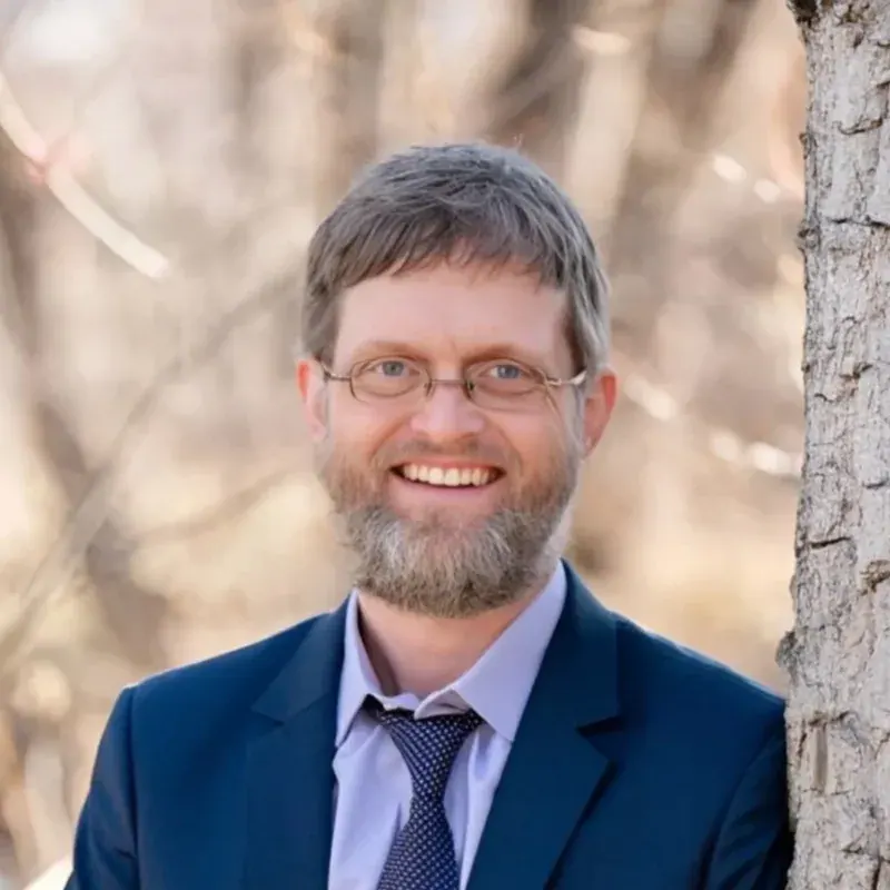 Travis Cox, PhD